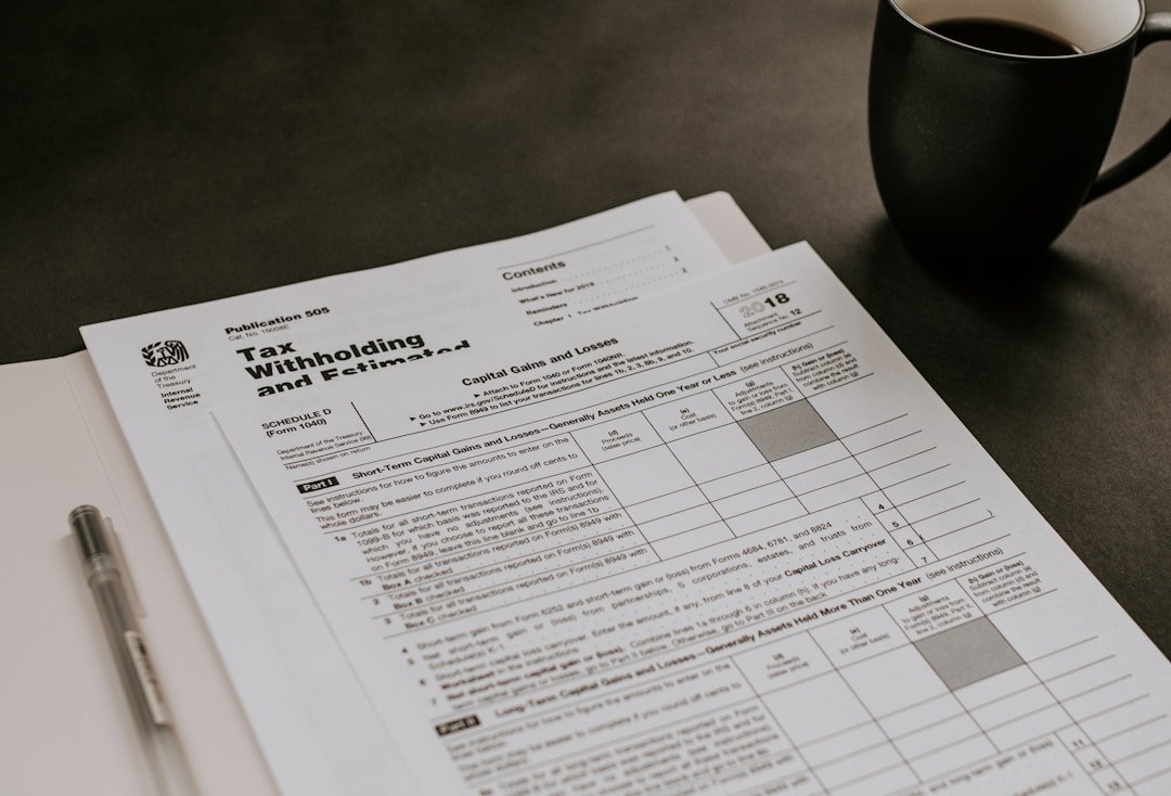 A personal tax return and pen resting on a desk